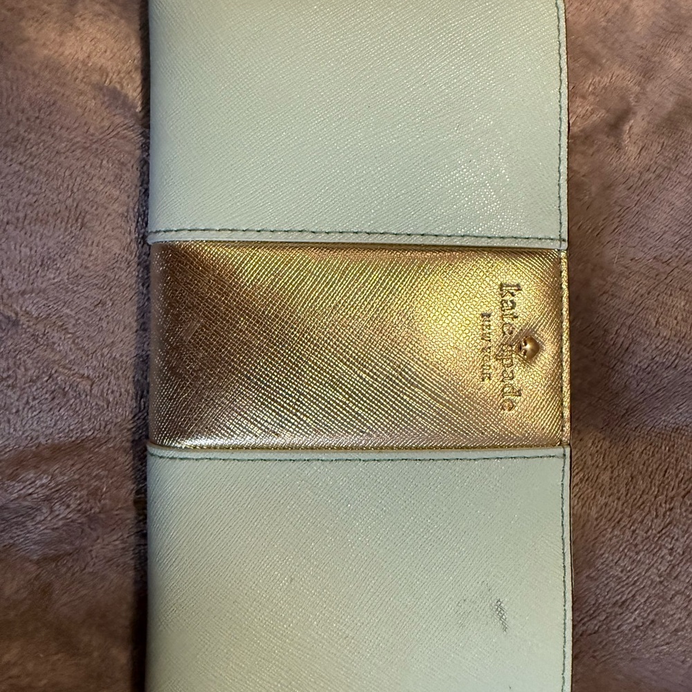 Kate Spade Gold teal.